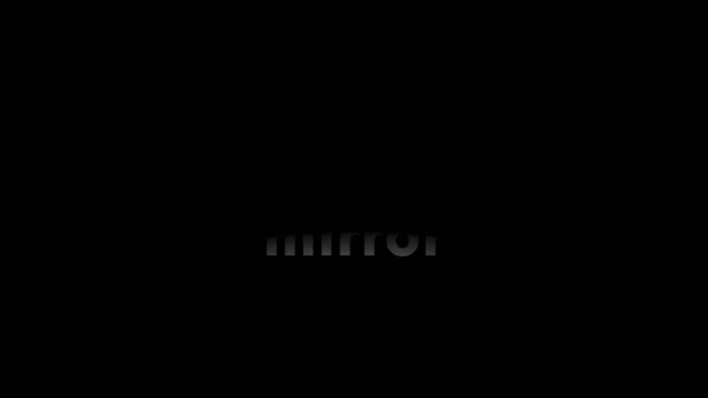 几乎全黑的横向画面中央偏下，极暗的灰色小写“mirror”字样只露出部分字形。文字上下边缘被黑色遮住，四周没有其他可辨人物、物件或场景，主要视觉差别集中在细窄的字母亮度上。